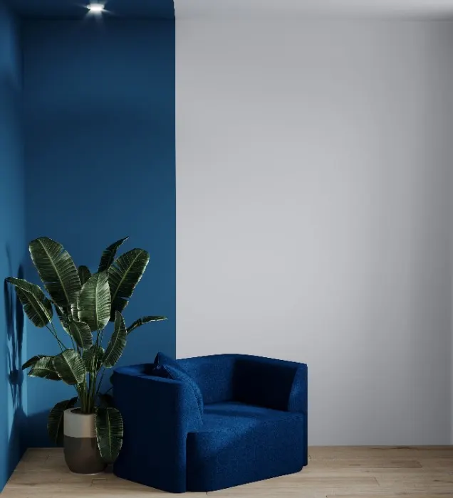 If you want a more subtle approach, try using a different shade of your room's colour, like this dark blue accent wall.