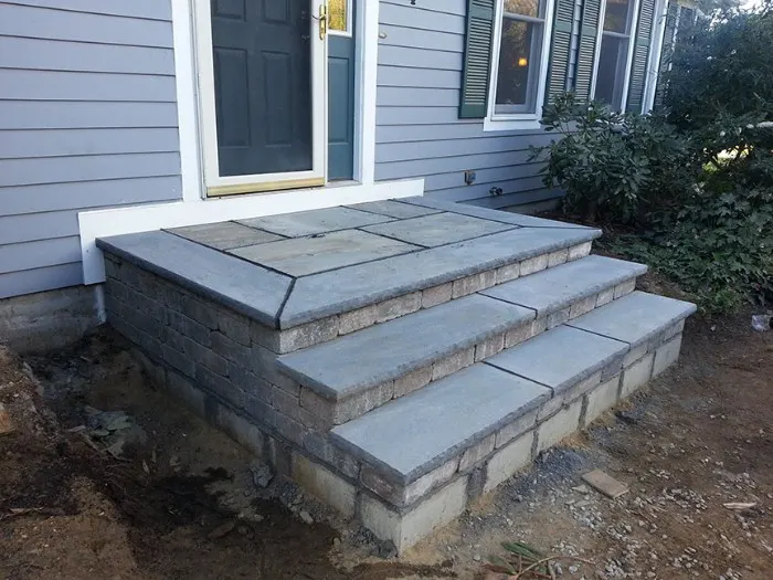 Distance of first tread from ground is too large. Code states risers to be a maximum of 7.875 inches.