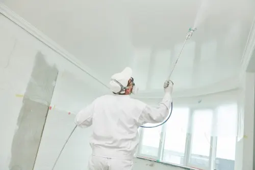 Spray painting a ceiling in Coal harbour