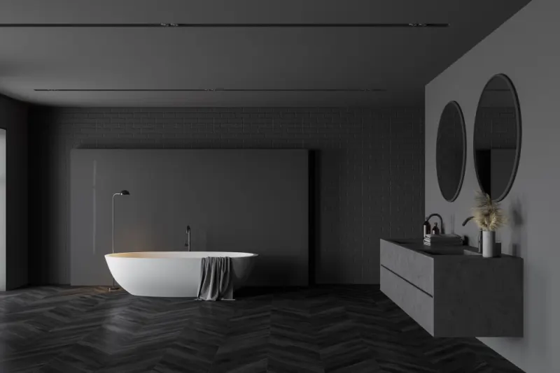 A dark wall color for your minimalistic bathroom can be a great way to add some sophistication and style to the room.