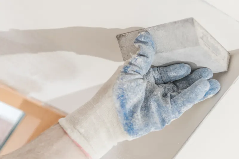 Fill holes and gaps, then make a soft sand to prepare the walls before the paint