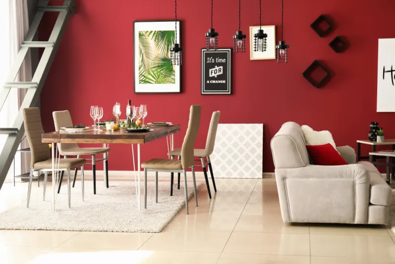 Red dining room accent wall creates a vibrant and excitement atmosphere