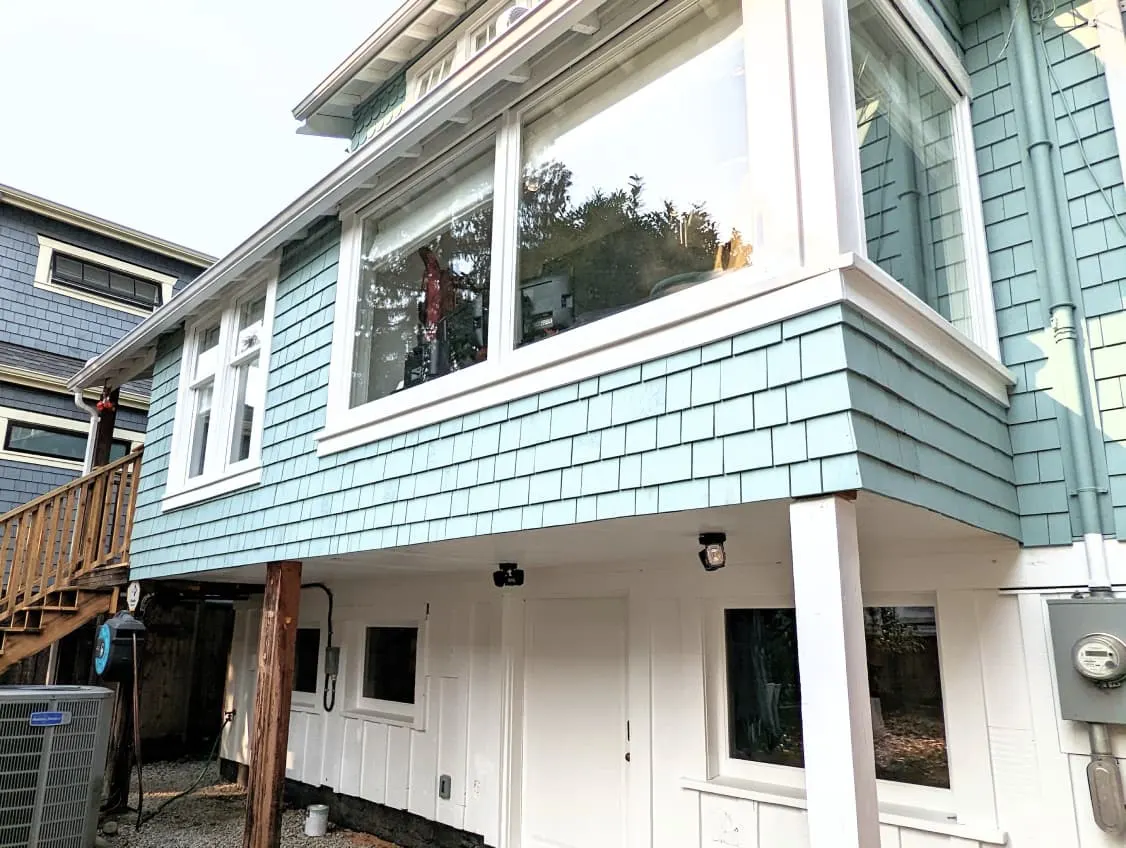 A Clear Day colour house after painting and repairment by renaissance painting company.