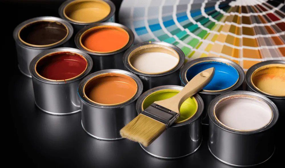 10 cans of paint and colour palettes.