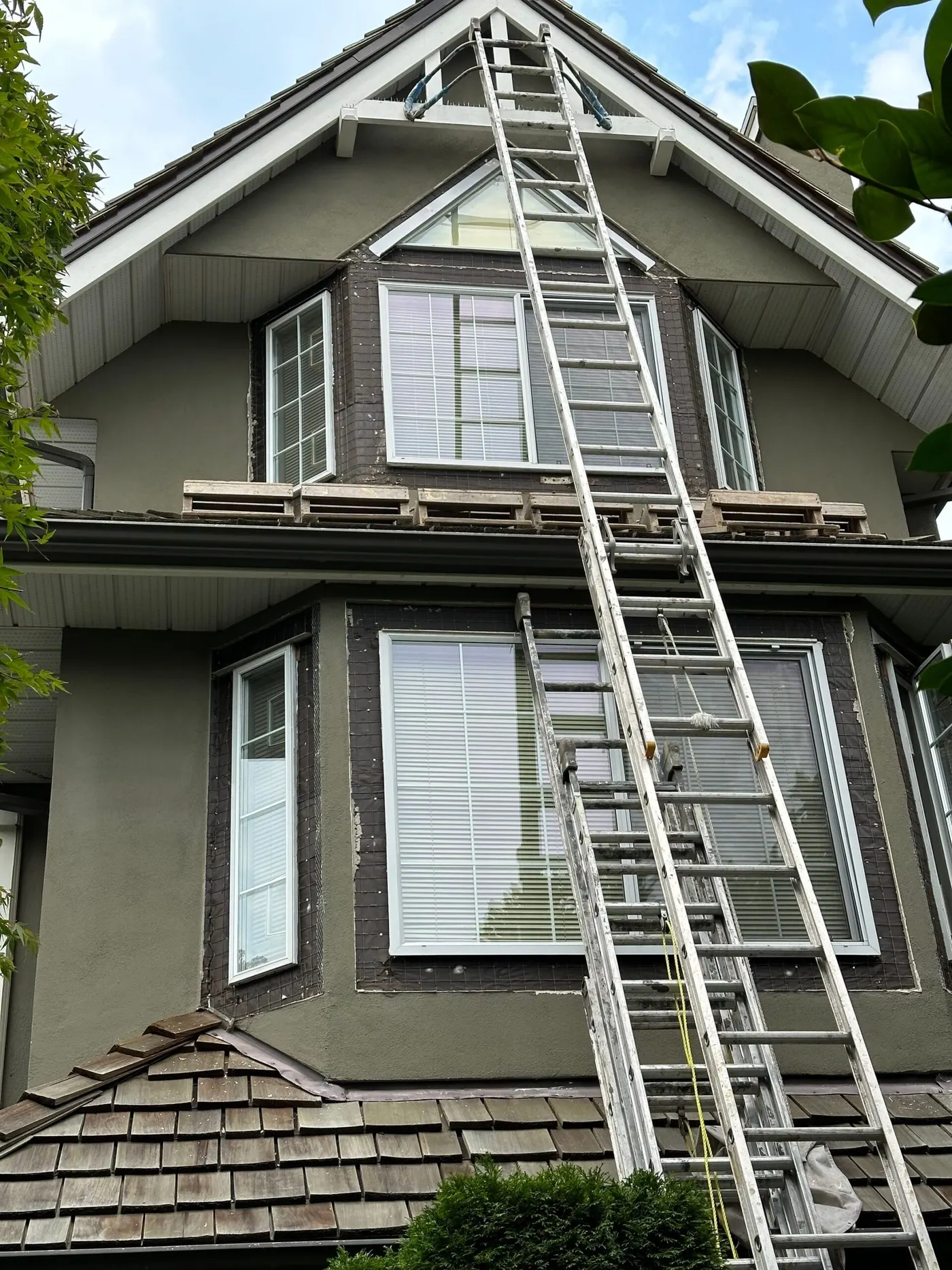 2025_01_Exterior Roofs ladders near roofs stucco 1 Aug 28 2023 02_23pm vmLN scaled - Renaissance Painting Vancouver