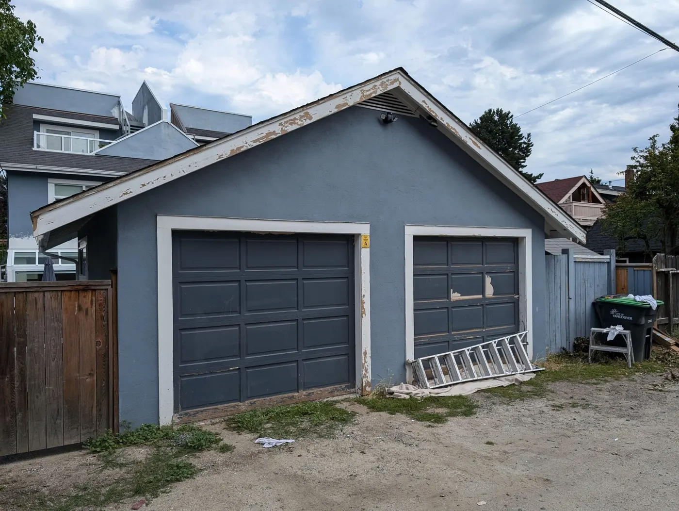 Blue freshly painted garage in Vancouver. Side view.
