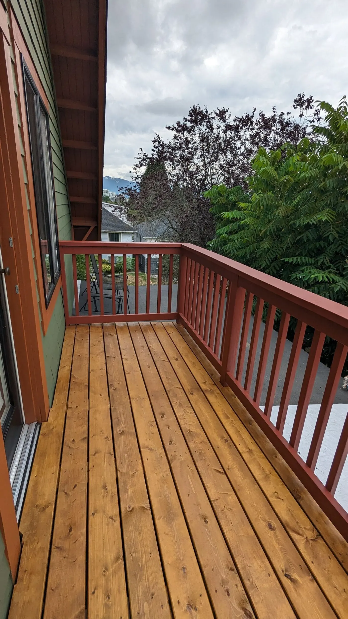Wooden deck with bicycle, deck maintenance and repair