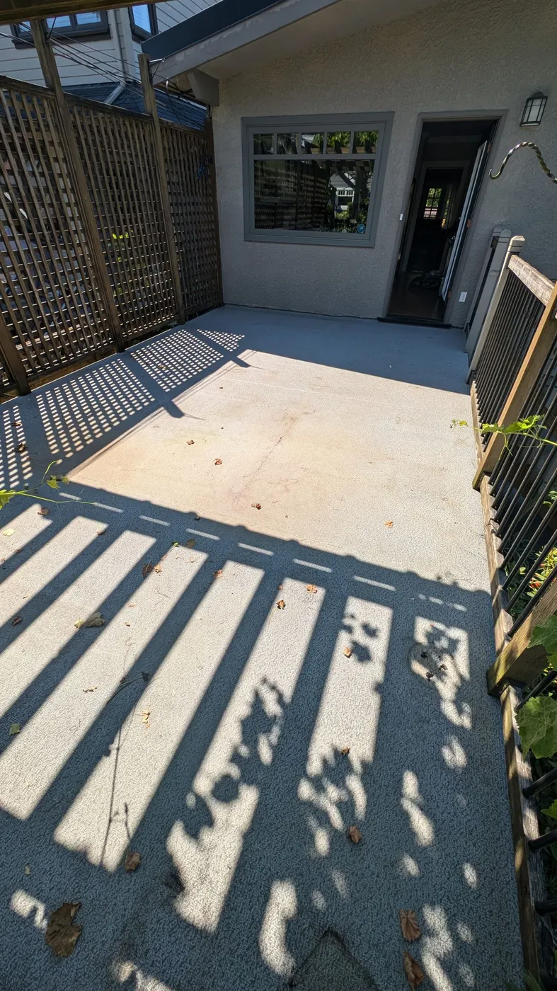 Old worn plywood deck substrate exposed during tear-off on a Vancouver, BC rooftop deck