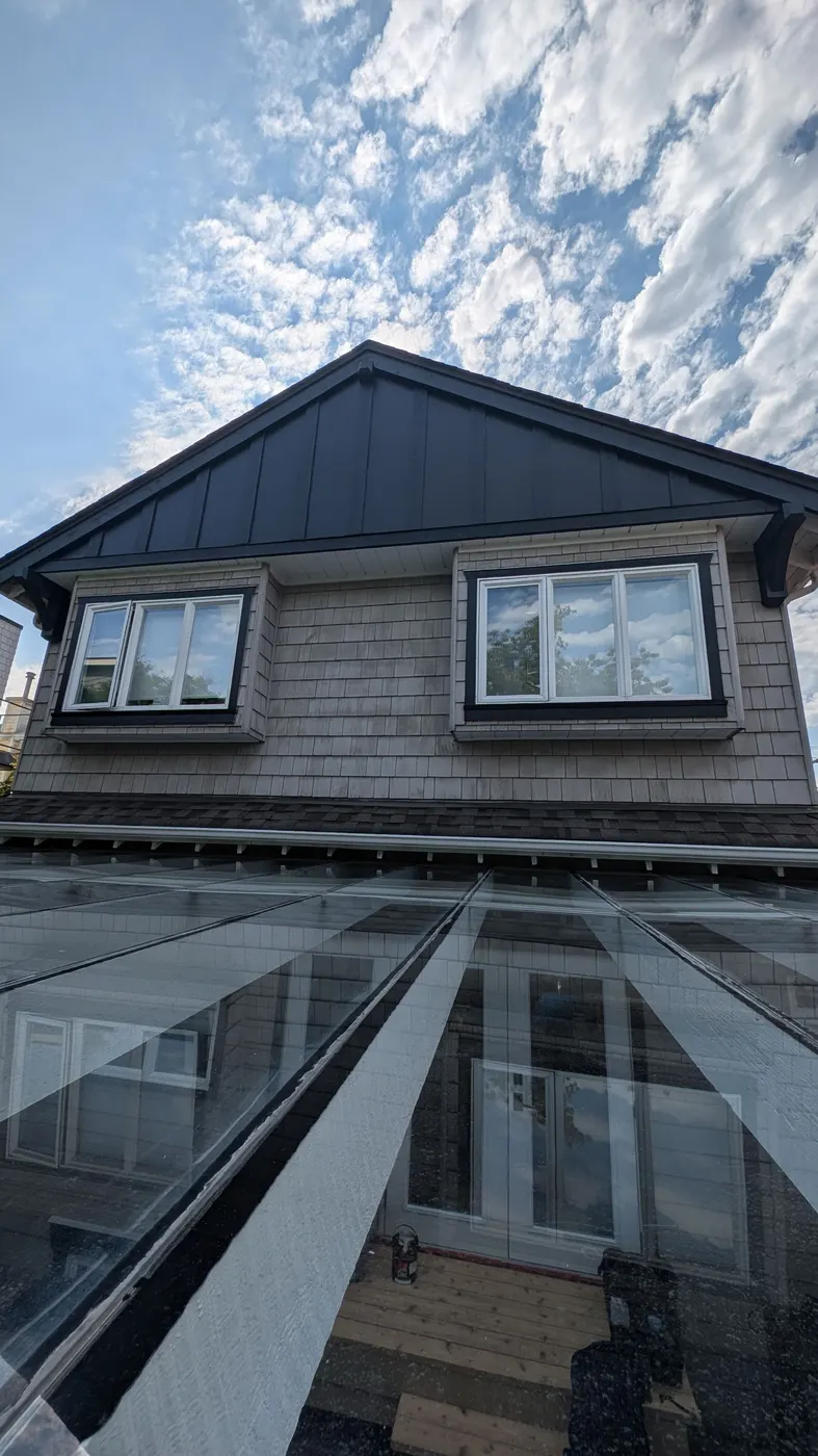 Vancouver, BC home dormer windows and covered patio roof reflecting the exterior renovation