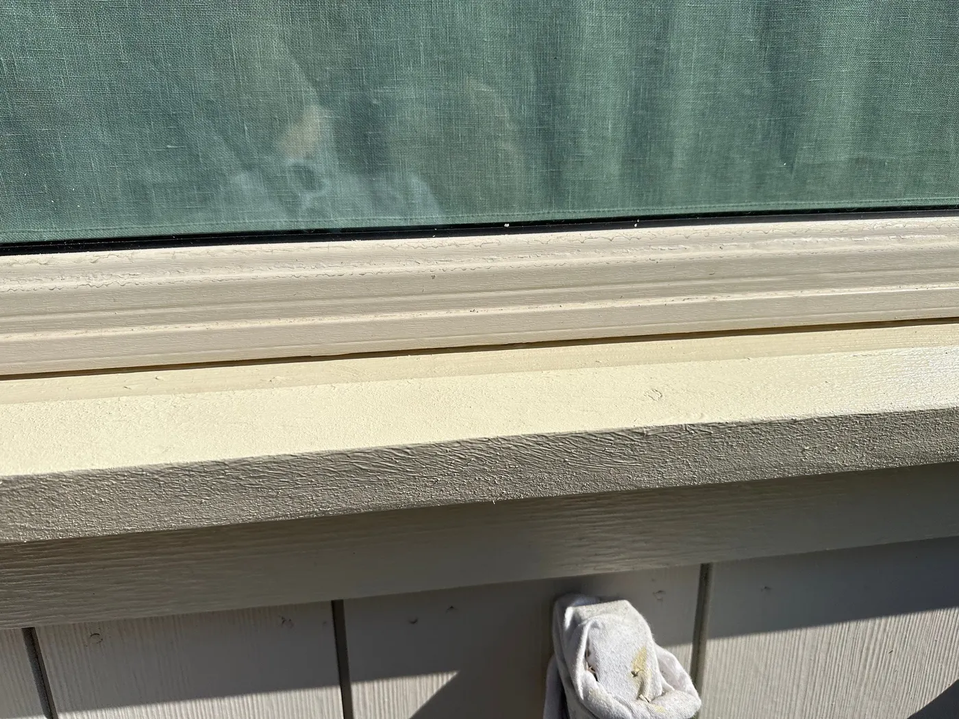 Close-up of a new unpainted wood window sill ready for finishing on a house exterior in Beechwood, Vancouver, BC.