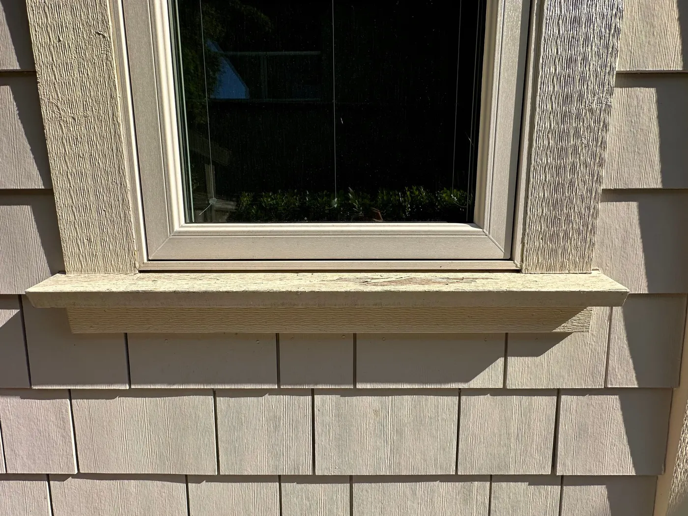 Exterior window trim and building paper flashing repair in progress on a home in Beechwood, Vancouver, BC.