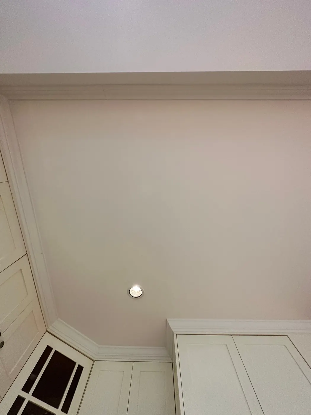 Freshly painted crown molding and corner trim in a Vancouver home, finished by Renaissance Painting.