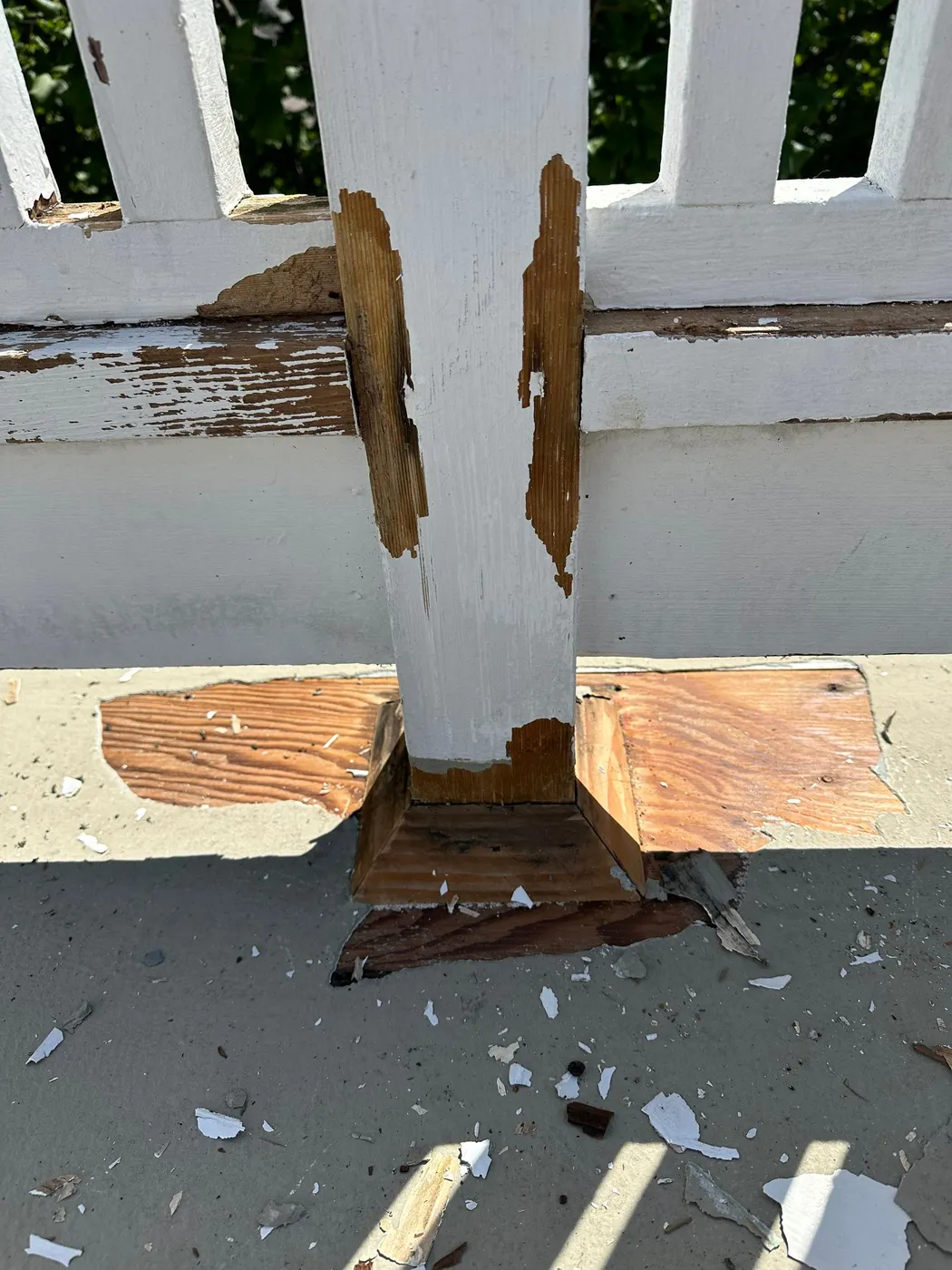 New pressure-treated wood post installed during deck repair on a Vancouver, BC home