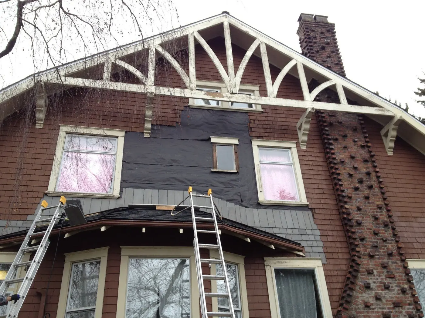 Craftsman-style home in Vancouver, BC mid-exterior renovation with new siding and trim installation