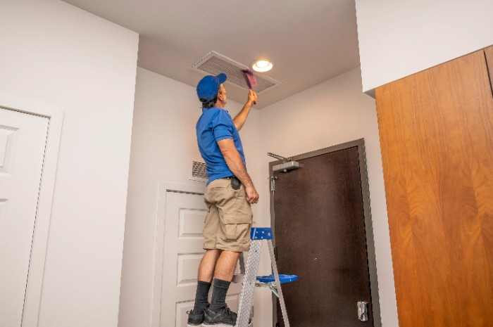 Prep the surface of the ceiling for optimal results.