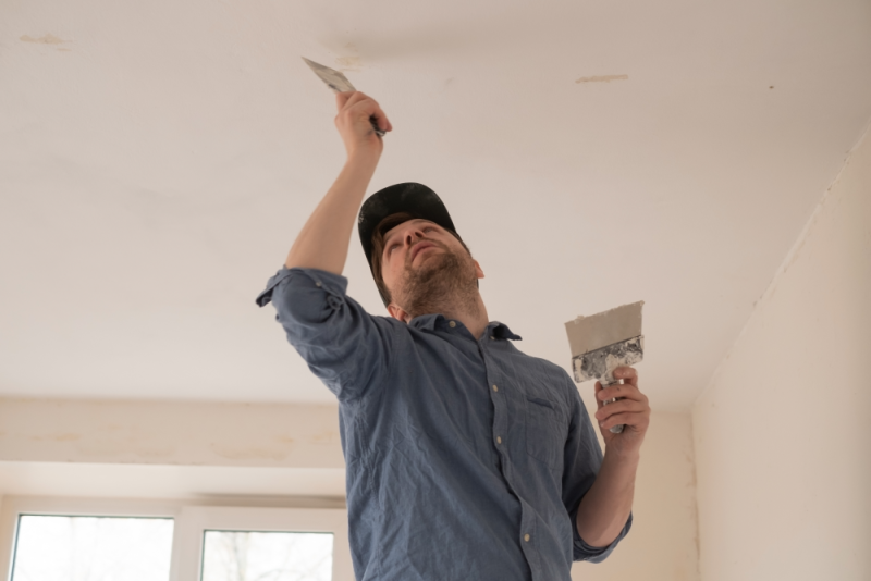 For high ceilings use a ladder to fill the holes