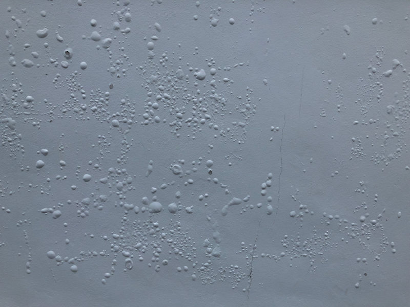 Paint bubbles or paint blisters on walls surface can be caused by many factors