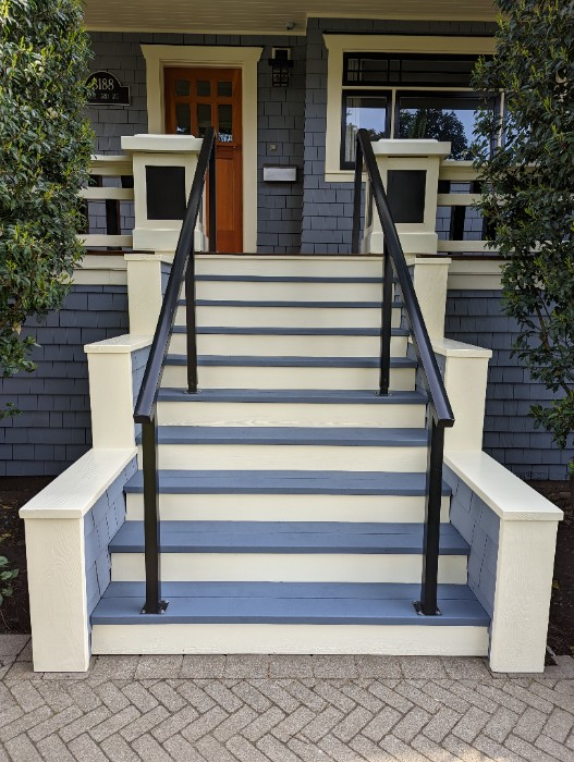 The color scheme on these front porch stairs are a great example of being creative, notice the dark color handrail. beginning, staircase, entry, concrete, house, front step ideas