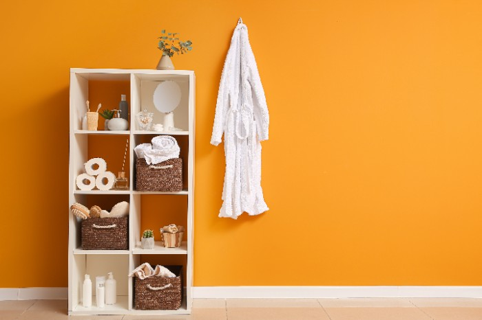 If you're looking for an orange-hued paint color to use in your bathroom, try Sherwin-Williams Incredibilious.