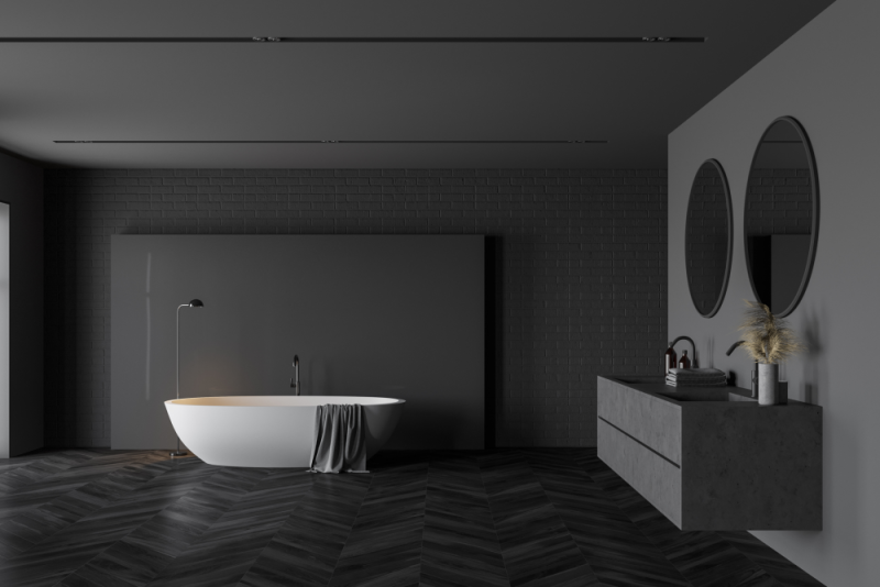 A dark wall color for your bathroom can be a great way to add some sophistication and style to the room.