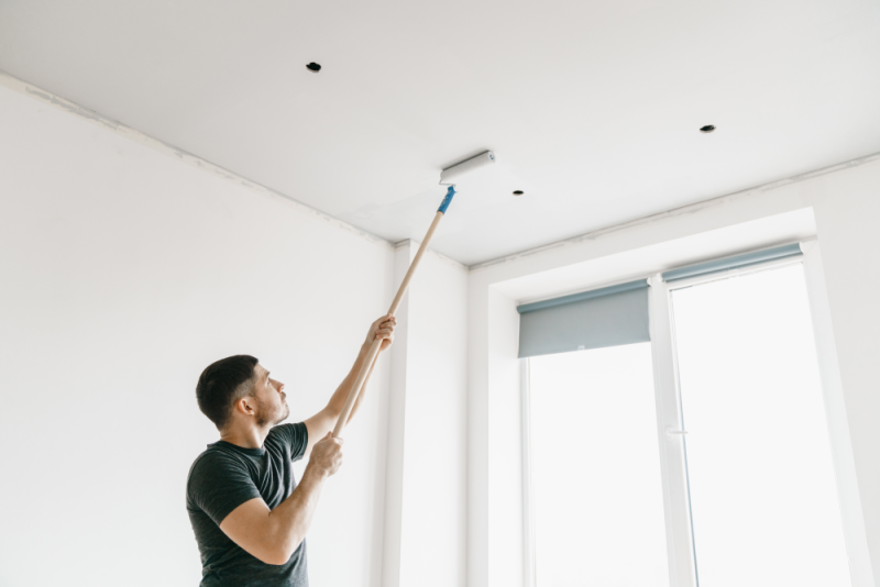 Use a roller to prime large section of the ceiling