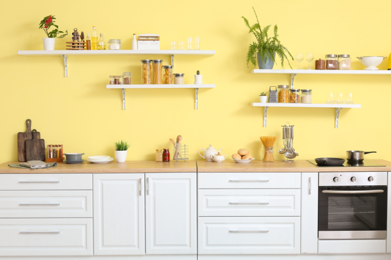 Yellow paint on kitchen wall, fresh and bright environment