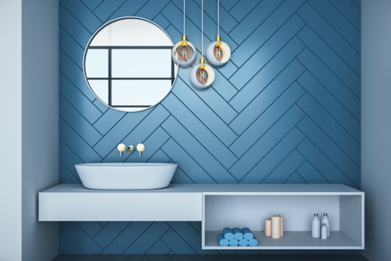 Sombre—blue bathroom make us feel inviting