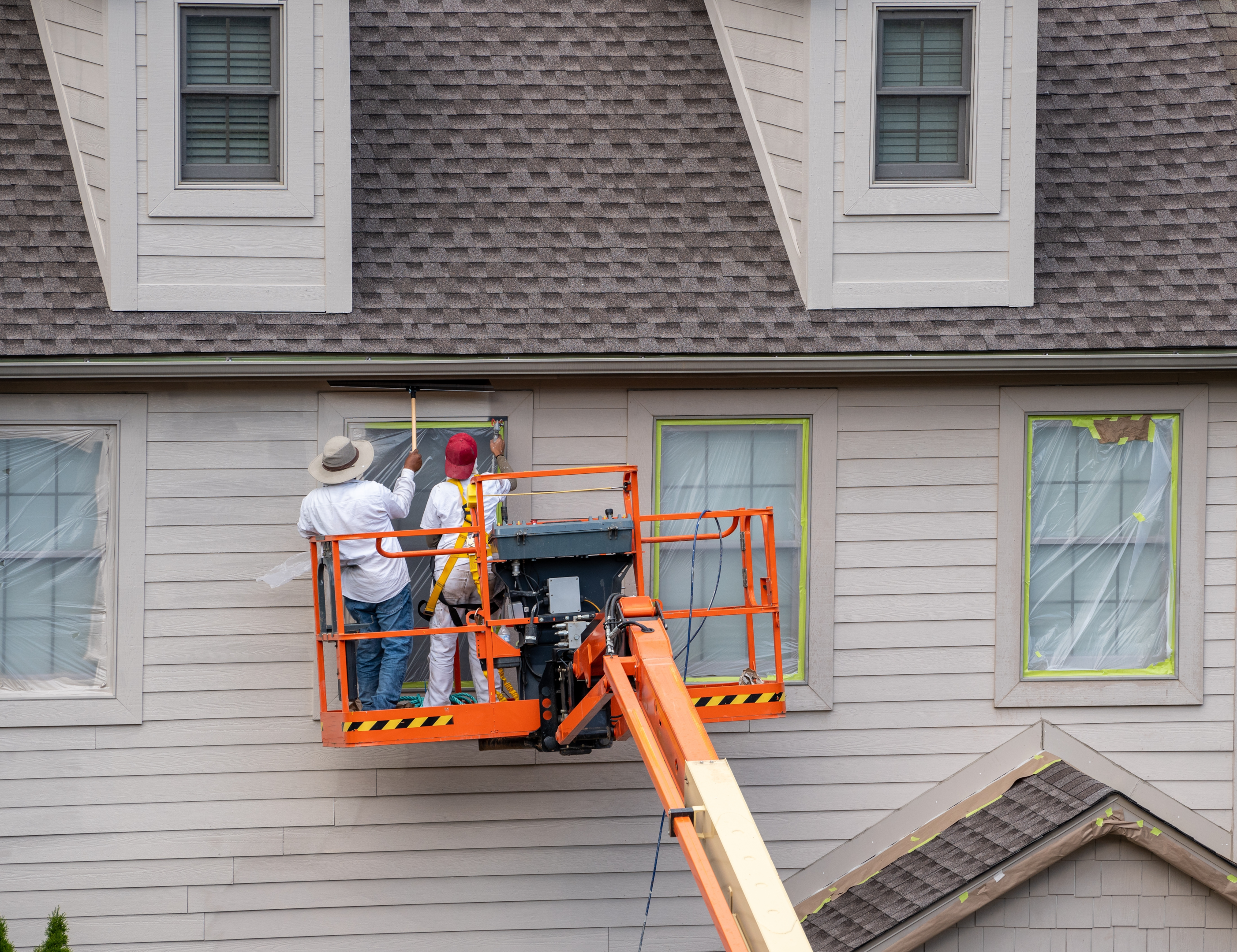 In some exterior paint jobs that are difficult to access, it is necessary to use a boom lift