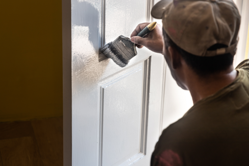 Once the paint's completely dry, you can screw on new knobs to completely transform your interior doors.