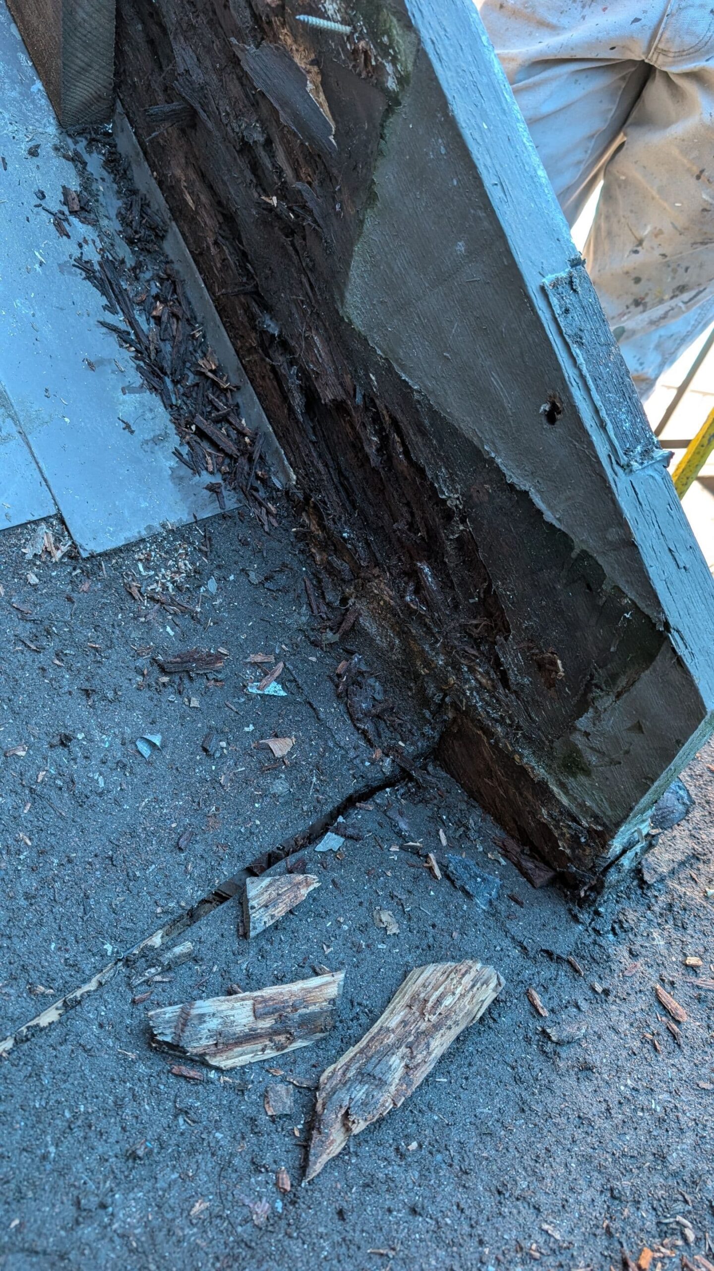 e96aa43d-93bb-4eca-b379-d55e777c5bab - Renaissance Painting Severe wood rot exposed on a Vancouver exterior structure, showing damaged framing that requires professional repair.
