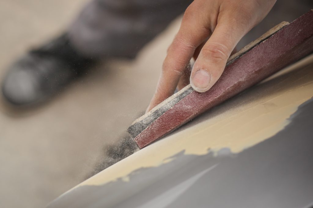 Sanding the surface after wood fillers