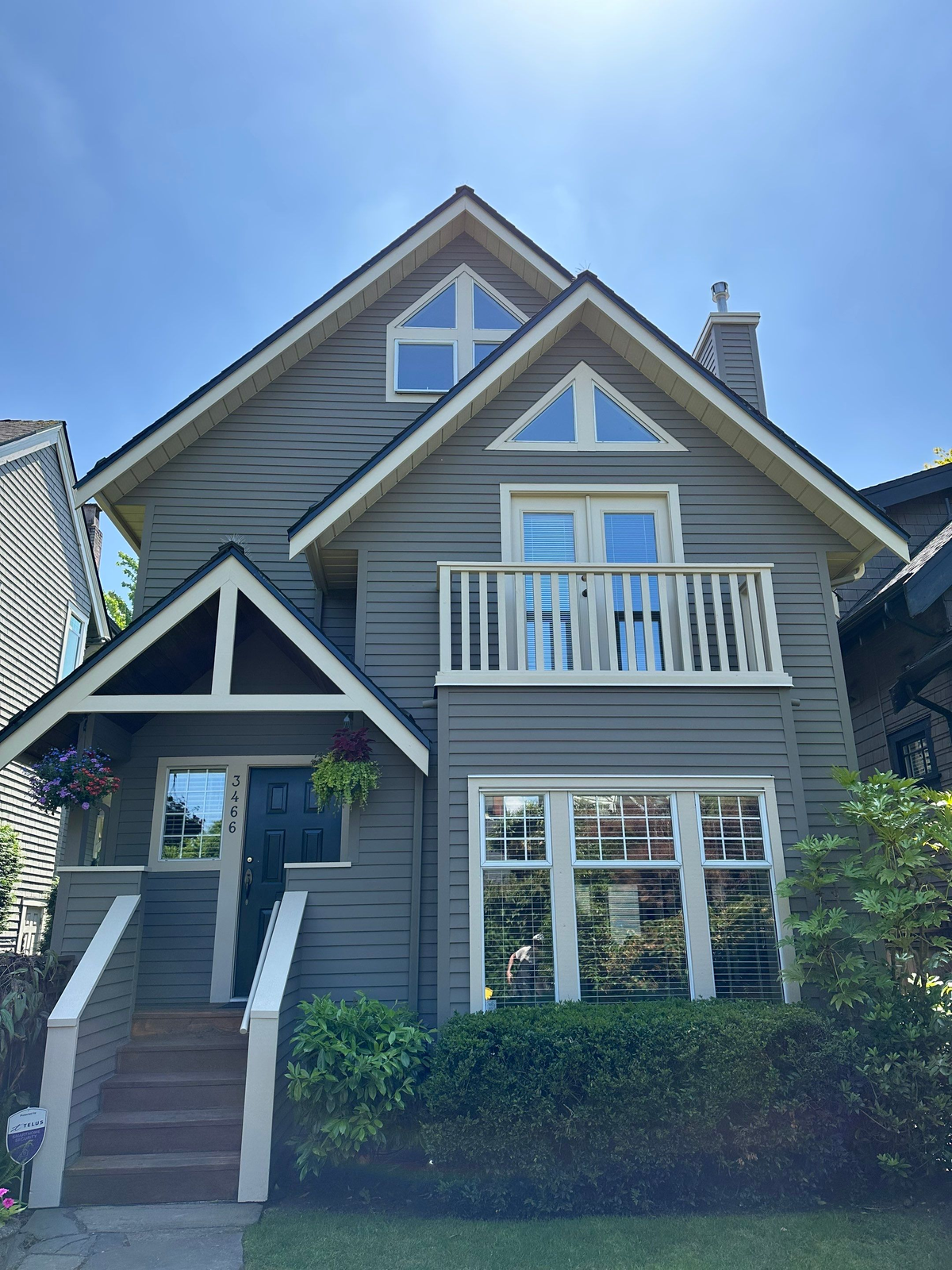 A nice house with a wooden siding.