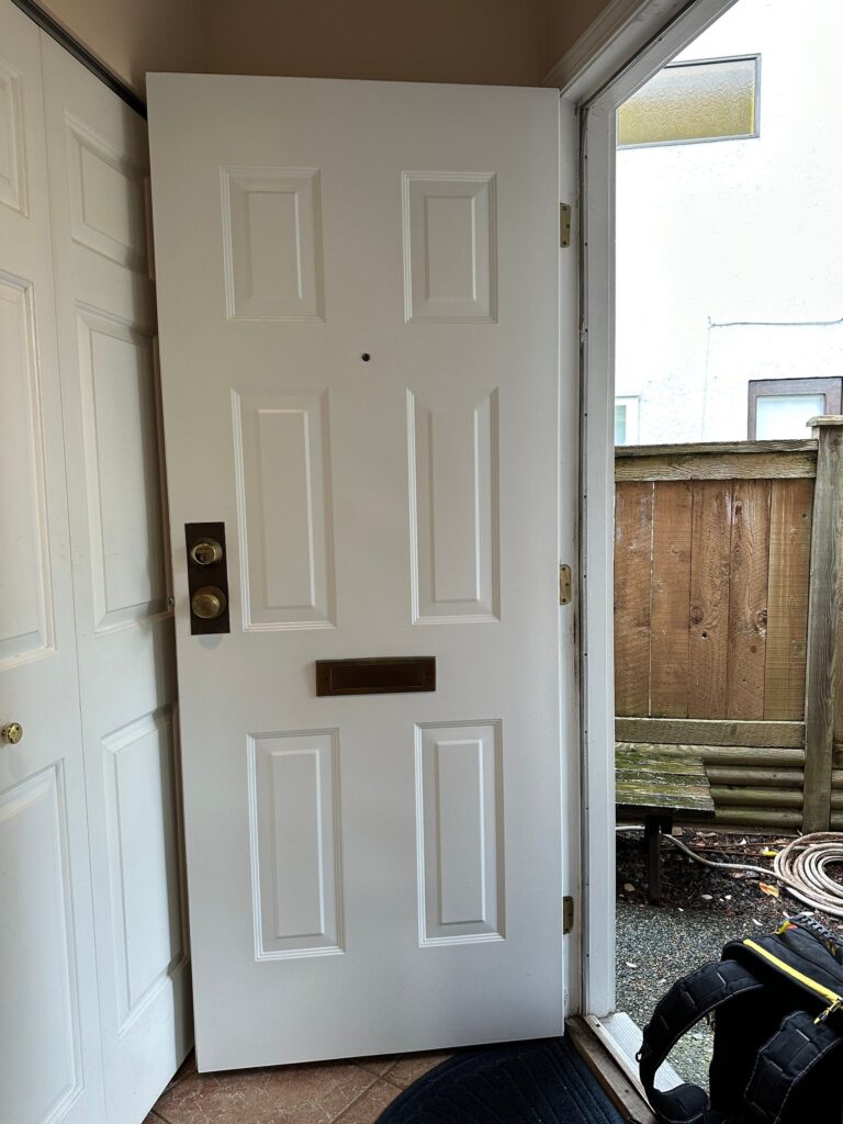 Front Side white door after painting.