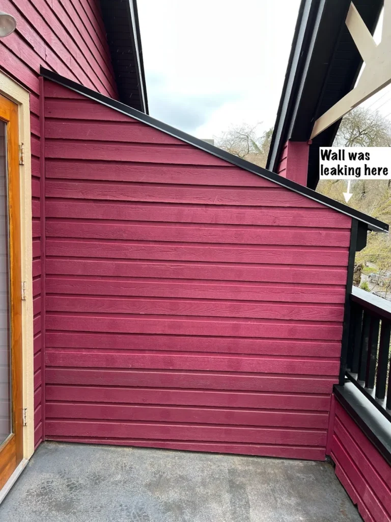 Exterior wood siding detail showing leak-prone area after interior house painting in Vancouver by Renaissance Painting.