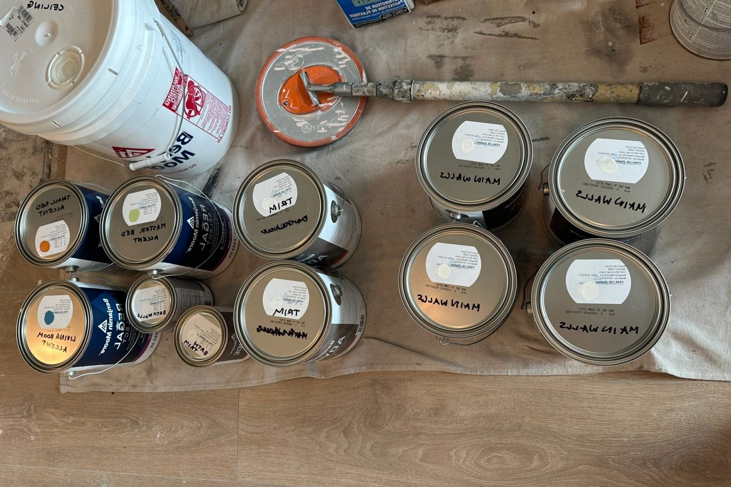 Cans of high quality paint from Benjamin Moore.